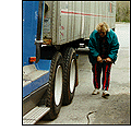 Myrna inspects truck
