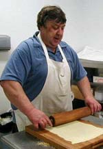 Jan Gadzo rolls out potica dough