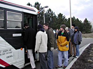 
Buses carried St. John's students to various parts of campus to continue the search.  At one point more than 200 students were searching at one time.
 (MPR Photo/Jeff Horwich)