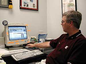 
John Yenne is the St. Cloud Times' online project manager.  Yenne says "Story Chat" helps readers closely interact with the newspaper. 
 (MPR Photo/Tim Post)
