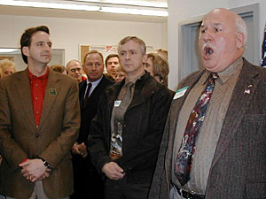 
 Bemidji Mayor Richard Lehmann, center,  and Bemidji baritone Joe Vene, right,  greet Gov.-elect Tim Pawlenty during a stop in Bemidji. Vene sang "America the Beautiful."
 (MPR Photo/Tom Robertson)
