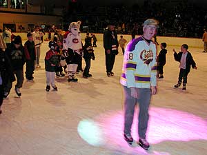 
Several hundred people skated at the arena before the hockey game, including St. Paul Pioneer Press columnist Nick Coleman, foreground, an avid hockey player himself. (MPR Photo/Marisa Helms)