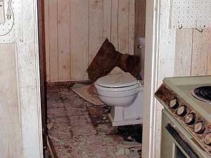 
The inside of the dilapidated house. It will need about $60,000 in repairs to make it ready for sale to a low income family. Many people in small towns and rural areas live in homes that need repairs. 

 (MPR Photo/Dan Gunderson)