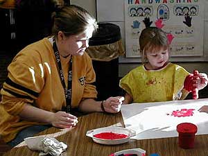 
Rhonna and Madison playing in the Head Start room. Madison spends a few hours every other Friday in a Head Start class in Hill City, on the way to her grandparents' house where she and Austin spend the afternoon.   (MPR Photo/Chris Julin)