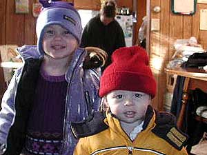 
Madison and Austin bundle up to go outside. Their mother takes them to Head Start, the doctor's office, their grandparents' house, and back home again between 8 a.m. and midnight. (MPR Photo/Chris Julin)
