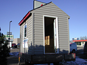 
This is the house Mid-Minnesota Builders Association Executive Officer Colleen Fraack predicted would win the Ultimate Fish House contest. The houses were judged by local volunteers, and raffled off to the public. (MPR Photo/Jeff Horwich)