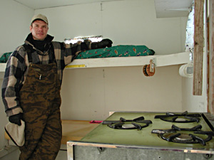 
Walleye Dan, a.k.a. Dan Eigen, guides in both the summer and winter. He owns four houses, including this one, as part of his business. (MPR Photo/Jeff Horwich)