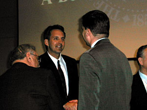 
Gov. Pawlenty greets several of his commissioners shortly before making his budget announcement. (MPR Photo/Laura McCallum)