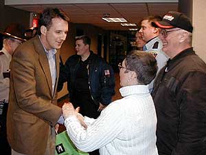 
Gov. Pawlenty is greeted by residents of International Falls as he arrived Wednesday. (MPR Photo/Tom Robertson)