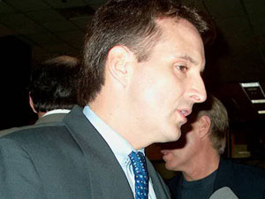 
"I do think it's unfair for Northwest Airlines or other businesses who are laying off people and asking employees to take wage concessions to be giving their top management big raises and bonuses," said Gov. Tim Pawlenty. (MPR Photo/Tom Scheck)