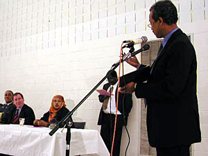 
Osman Sahardeed did not appear to warm up to the law enforcement representatives.  He accused them of not disciplining officers that he says continually harass Somalis.
 (MPR Photo/Marisa Helms)