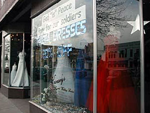 
In this Mississippi River town, it's not hard to spot gestures of support for the U.S. In one storefront, even prom dresses are arranged to pay tribute to Old Glory. (MPR Photo/Nikki Tundel)