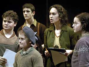 
The children of the orphanage (l. to r. Conor McDonald, Mitchell Y. Perry, Charlie Textor, Angela Harold, and Teresa Marie) make plans to perform a play. (Photo courtesy of Children's Theatre Company)