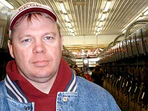 
Dwight Hasselquist is co-owner of Plymouth Dairy Farms
near Le Mars, Iowa.  He has about 2,500 cows.  His milking
parlor can hold 80 cows at once.  
    (MPR Photo/Mark Steil)