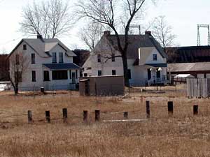 
Homes were built to help service the lighthouse on Wisconsin Point.  The homes have been used as a Coast Guard base and a U.S. Naval Reserve center.  The homes and 18 surrounding acres are being abandoned by the federal government. (MPR Photo/Bob Kelleher)