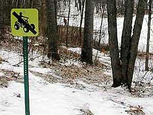 
Despite the efforts of the DNR to post areas in the forest as off limits, some ATV riders ignore the signs or make new trails nearby. 
 (MPR file photo)