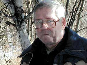 
Ed Lindquist is a Wildlife Biologist with the Superior National Forest.  He's been documenting lynx for the past year, monitoring lynx tracks, and collecting lynx droppings for DNA testing. (MPR Photo/Bob Kelleher)