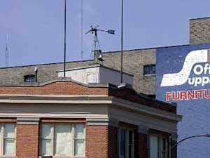 
The Macalester turbine is one of only a handful of urban wind turbines nationwide. Another is perched high on a roof above University Ave., in St. Paul.    (MPR Photo/Mary Losure)