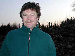 
Bill Lane, a.k.a. the Owlman, in a spot formerly frequented by boreal owls. (MPR Photo/Mary Losure)