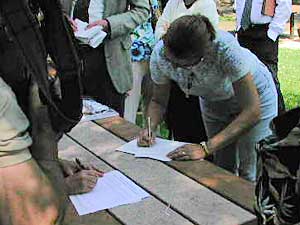 
One of the first people to sign the petition calling for a repeal of the new handgun law. (MPR Photo/Art Hughes)