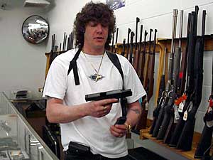 
Gun shop owner Jeff Kempf says he doesn't expect a big jump in gun sales as a result of the new law. He says most permit-seekers already have guns, so they will likely buy more accessories. (MPR Photo/Mark Zdechlik)
