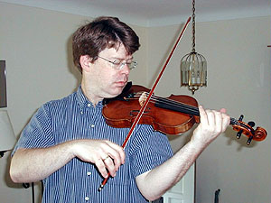 
Violinist Robert Hanford plays with the Minnesota Orchestra.  He owns one of Wehling's bows.  Hanford says when he tried the bow it was a perfect match. (MPR Photo/Erin Galbally)