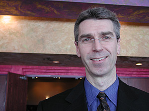 
HealthPartners Vice President of Health Promotion Nico Pronk says HMOs and other insurers have to adapt to stem the rates of obesity. Pronk spoke at a recent HealthPartners conference for health providers called "The Obesity Epidemic." (MPR Photo/Jeff Horwich)