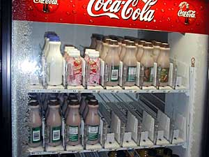 
Duluth's Denfeld High school has three banks of vending machines, providing healthy fare, as well as high sugar and fat snacks.  The machines can generate $40,000 a year for school supplies. (MPR Photo/Bob Kelleher)