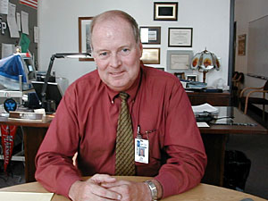 
Principal Bill Dunn says cuts in the current year's budget resulted in the loss of seven teaching positions. (MPR Photo/Tim Pugmire)
