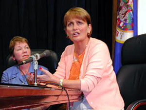 
"We're the one's being victimized. We're the ones who have to be looking over our shoulders all the time," said Pam, Poirier is the mother of Katie Poirier, who was killed in 1999. Sen. Jane Ranum looks on. (MPR Photo/Marisa Helms)