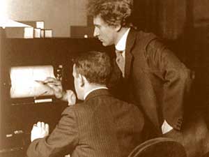 
Songcatcher Percy Grainger (standing) used his talents as both a composer and a performer to promote the folk music he collected.
 (Photo courtesy of Library of Congress/National Geographic)