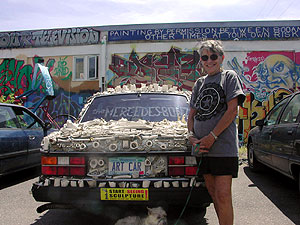 
B.J. Zander covered her car with animal bones, and called it her Mercedes Bonz. It's actually a Volvo, but she says she has always wanted a Mercedes, so that's what she calls it. She used to have a Mercedes Beanz, covered in thousands of -- you guessed it -- beans.  (MPR Photo/Euan Kerr)
