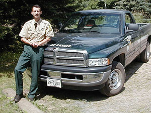 
Moose Lake Park Manager Don DelGreco runs the small park by himself for eight months of the year.  In the summer he's helped by a small staff of seasonal employees. (MPR Photo/Bob Kelleher)