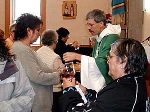 
Each Sunday, several dozen people attend Mass at St. Mary's Catholic Mission. The mission was established at Red Lake in 1858. There's been a Catholic elementary school here for more than 100 years.   
 (MPR Photo/Tom Robertson)