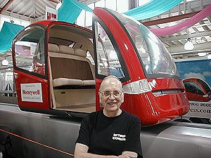 
Ed Anderson began working on Personal Rapid Transit while employed by the University of Minnesota.  He designed the computer program that's key to its operation.  Anderson's company, Taxi 2000, is partially owned by the University. (MPR Photo/Dan Olson)