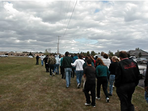 
Parents walk to the school to pick up their children. (MPR Photo/Tim Post)