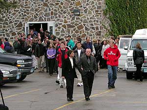 
Mourners stream out of St. Boniface Catholic Church
after Aaron Rollins' funeral. More than 1,000 people attended. (MPR Photo/Annie Baxter)