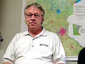 
Jim Alders, a manager at Xcel Energy, says it may be difficult for the company is to meet a goal of increasing its wind output to 10 percent of its total output, because  wind generation is intermittent. (MPR Photo/Rob Schmitz)