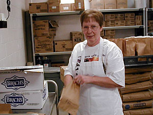 
Lottery winner Alice Kobylinski was back at work, packing lunches after winning a part of the lottery Powerball jackpot. (MPR Photo/Tim Post)