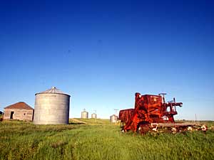 
A McCormick-Deering grain harvester in a ghost town in South Dakota. (Photo by Lee Klancher)