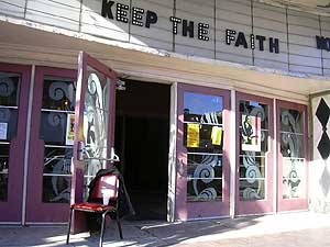 
A sign on the NorShor marquee hints at the hope the historic theatre will re-open. (MPR Photo/Stephanie Hemphill)