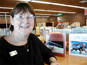 
Barb Lantis of the Great River Regional Libary in St. Cloud says Doug Wood's books have different meanings for different readers.  She says they're the kind of books parents and children should read and discuss.  (MPR Photo/Tim Post)