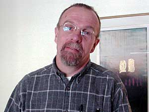 
Lee Lewis is executive director of Clare House, says the mission of the staff has changed over the years, as more people with AIDS and HIV are living with the disease instead of dying. (MPR Photo/Greta Cunningham)