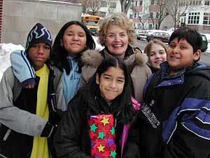 
Anne Leduc, a teacher at Jefferson Elementary in Minneapolis, poses with some of her students. (MPR photo/Jim Bickal)