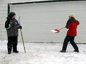 
Ashley Birdseye and her friends play hockey and dig holes in the snow.  For fun. (MPR Photo/Stephanie Hemphill)