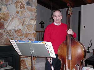 
Denny Douma has played bass for 40 years, though he's an insurance salesman by day. (MPR Photo/Annie Baxter)