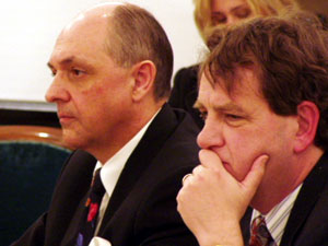 
Mike Vekich, left, interim lottery director, told lawmakers he's making changes in the way the lottery is run. At right is Don Feeney, head of research and planning at the lottery.
 (MPR Photo/Michael Khoo)