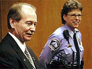 
Deputy Chief Lucy Gerold, shown here with former chief Robert Olson, says she "would never do anything to
undermine any oath and the trust I've built with the people of Minneapolis." (MPR file photo)