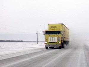 
Marvin Windows, Arctic Cat, Polaris, and International Paper are all large companies that depend on Highway 11. (MPR Photo/Bob Reha)