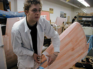 
Washburn students are restoring an old aircraft by putting new fabric on the fuselage (MPR photo/Dan Olson)